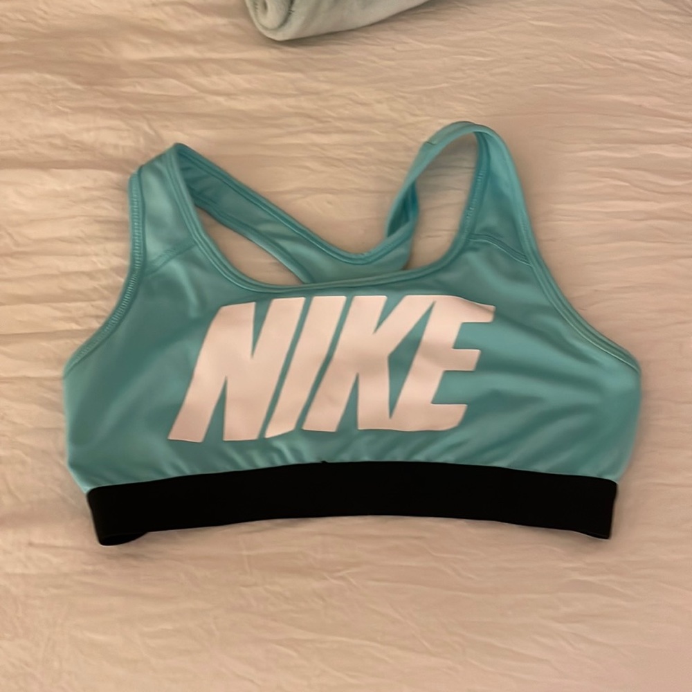 Size small teal blue Nike sports bra